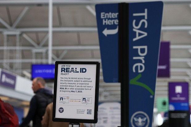 A sign outside a TSA checkpoint at Chicago O'Hare International Airport informs travelers of the REAL ID deadline.
Mandatory Credit:	Aaron M. Sprecher/AP via CNN Newsource