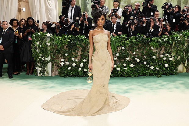 Tyla’s sculpted sand gown, created by Balmain from a plaster mold of her body, was one of the most talked-about looks of 2024. The singer had to be lifted up the stairs to the entrance of the Met.
Mandatory Credit:	Jamie McCarthy/Getty Images via CNN Newsource