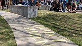 Virginia Commonwealth University student Sereen Haddad speaks at a protest on the VCU campus on April 14. Haddad, one of the protest organizers, called for VCU to refuse cooperation with federal immigration enforcement actions.