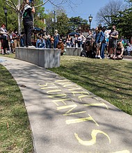 Virginia Commonwealth University student Sereen Haddad speaks at a protest on the VCU campus on April 14. Haddad, one of the protest organizers, called for VCU to refuse cooperation with federal immigration enforcement actions.