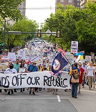 Demonstrators gathered in Richmond on Thursday, May 1, for the “May Day Strong” rally and march, part of a statewide movement marking International Workers’ Day. Organized by 50501 Virginia, the protest began in Monroe Park and continued to Capitol Square. (Julianne Tripp Hillian / Richmond Free Press)