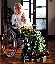 Sister Inah Canabarro Lucas, pictured in February 2024, puts her hands together in prayer.
Mandatory Credit:	Carlos Macedo/LongeviQuest/AP via CNN Newsource