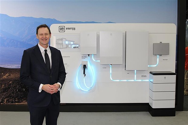 Duncan Aldred in front of a display of GM Energy products