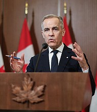 Canada's Prime Minister Mark Carney speaks at a news conference about the US tariffs on Parliament Hill in Ottawa on April 3.
Mandatory Credit:	Dave Chan/AFP/Getty Images via CNN Newsource