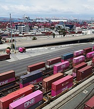 Shipping containers sit on rail road tracks at the Port of Long Beach in Long Beach, California.
Mandatory Credit:	David Swanson/Reuters via CNN Newsource