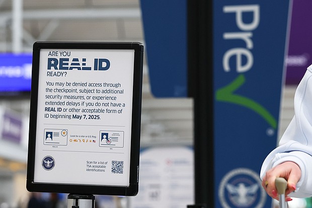 A US Department of Homeland Security "Real ID" compliant driver's license sign is seen outside the TSA checkpoint at Chicago O'Hare International Airport on April 23.
Mandatory Credit:	Aaron M. Sprecher/AP via CNN Newsource