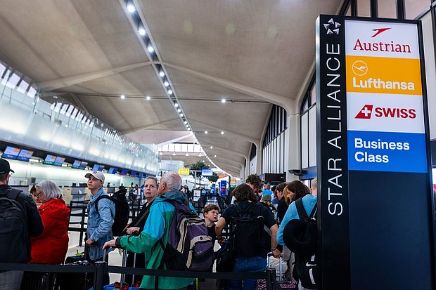 People wait in line for a delayed flight at Newark International Airport on May 5, 2025
Mandatory Credit:	Spencer Platt/Getty Images via CNN Newsource