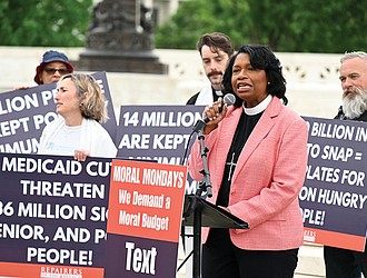 The Rev. Leslie Copeland-Tune speaks at a rally near the U.S. Supreme Court on May 5 in Washington.