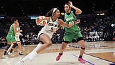 Chicago Sky forward Angel Reese (5) drives to the basket against Brazil forward Manu Alves in the second half of a WNBA exhibition game in Baton Rouge, La.