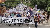 Demonstrators gathered in Richmond on Thursday, May 1, for the “May Day Strong” rally and march, part of a statewide movement marking International Workers’ Day. Organized by 50501 Virginia, the protest began in Monroe Park and continued to Capitol Square.