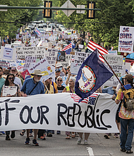 Demonstrators gathered in Richmond on Thursday, May 1, for the “May Day Strong” rally and march, part of a statewide movement marking International Workers’ Day. Organized by 50501 Virginia, the protest began in Monroe Park and continued to Capitol Square.