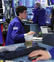 Traders work on the floor of the New York Stock Exchange.
Mandatory Credit:	Michael M. Santiago/Getty Images via CNN Newsource