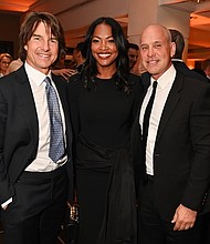 LONDON, ENGLAND - MAY 12: (L to R) Tom Cruise, Tracy Robbins and Brian Robbins attend the BFI Chair's dinner where Tom Cruise was awarded a BFI Fellowship at The Rosewood on May 12, 2025 in London, England. ..Photo by Dave Benett