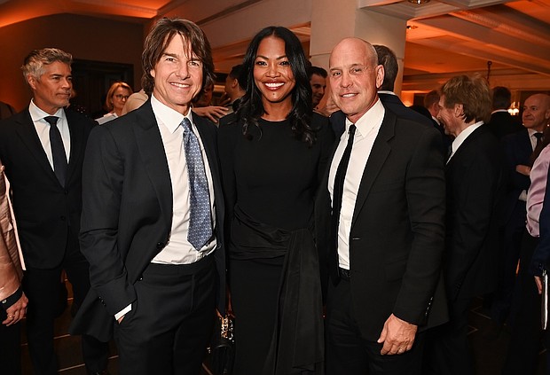 LONDON, ENGLAND - MAY 12: (L to R) Tom Cruise, Tracy Robbins and Brian Robbins attend the BFI Chair's dinner where Tom Cruise was awarded a BFI Fellowship at The Rosewood on May 12, 2025 in London, England. ..Photo by Dave Benett