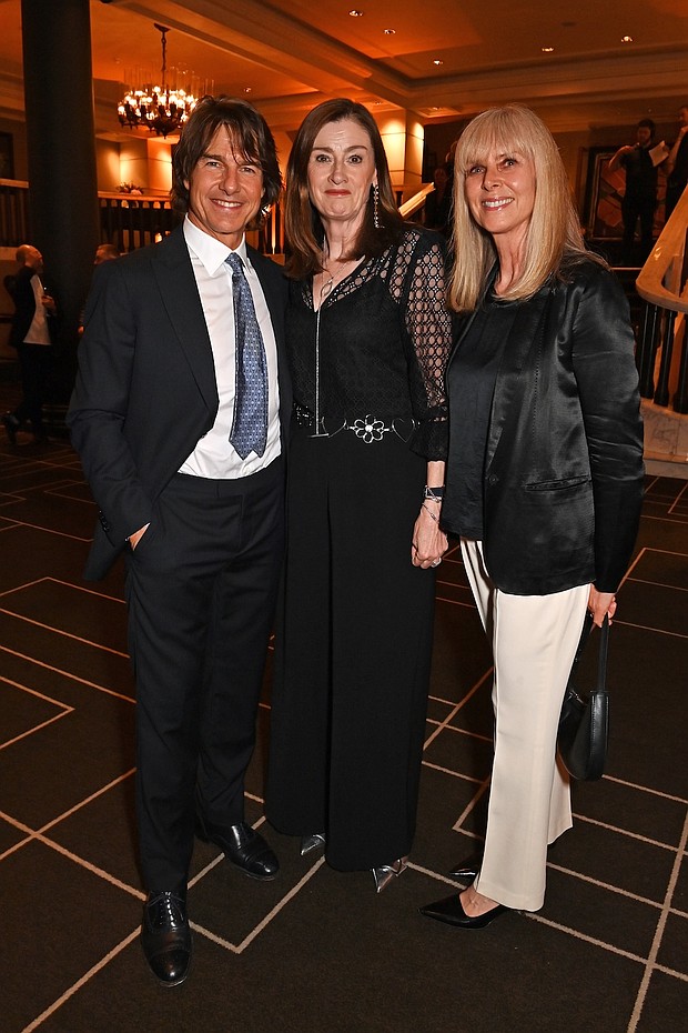LONDON, ENGLAND - MAY 12: (L to R) Tom Cruise, Chief Executive of BAFTA Amanda Berry and Maggie Todd attend the BFI Chair's dinner where Tom Cruise was awarded a BFI Fellowship at The Rosewood on May 12, 2025 in London, England. ..Photo by Dave Benett