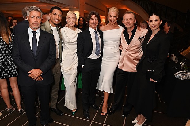 LONDON, ENGLAND - MAY 12: (L to R) Esai Morales, Greg Tarzan Davis, Pom Klementieff, Tom Cruise, Hannah Waddingham, Simon Pegg and Hayley Atwell attend the BFI Chair's dinner where Tom Cruise was awarded a BFI Fellowship at The Rosewood on May 12, 2025 in London, England. ..Photo by Dave Benett