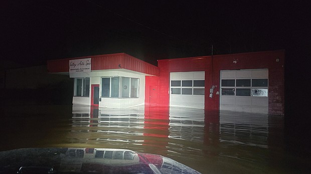 A flooded Valley Auto Spa sits in Big Stone Gap after Hurricane Helene passed through the area in 2018. It was one of many buildings affected by the storm.