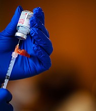 Changes to the way FDA approves Covid-19 vaccines will limit who can get them in the fall.
Mandatory Credit:	Jon Cherry/Getty Images via CNN Newsource