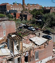 A drone view shows the aftermath of an EF3 tornado in St. Louis, Missouri.
Mandatory Credit:	Lawrence Bryant/Reuters via CNN Newsource