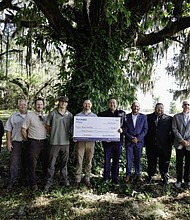(left to right) Ciara Calub, corporate social responsibility, Hyundai Motor North America, Russ Webb, wildlife refuge manager, U.S. Fish and Wildlife Service, Nathan Hawkaluk, deputy project leader, U.S. Fish & Wildlife Service, Jake Merendino, biologist, Ducks Unlimited, Chad Ledford, director of development, Ducks Unlimited, Brandon Ramirez, director, corporate social responsibility, Hyundai Motor North America, Jason York, regional parts and service, southern region, Hyundai Motor America, Jason Blankenship, district parts and service, southern region, Hyundai Motor America, Doug Bush, dealer network development, southern region, Hyundai Motor America, Vanessa Perez, corporate social responsibility, Hyundai Motor North America at Savannah National Wildlife Refuge in Hardeeville, S.C. on May 14, 2025 (Photo/Hyundai)