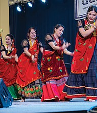 Women from the Nepali community perform a traditional Himalayan dance during the Asian American Festival at the Greater Richmond Convention Center on May 16.