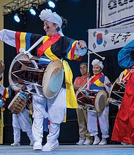 Members of the Korean community celebrate during the annual event, which has been held for more than 25 years, that showcases the cultures, traditions and cuisines of Asian American communities across the region.