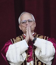 Pope Leo XIV appears May 8 on the balcony of St. Peter’s Basilica at the Vatican.
