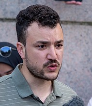 Student negotiator Mahmoud Khalil is seen at a pro-Palestinian protest encampment on the Columbia University campus in New York, April 29, 2024.
Mandatory Credit:	Ted Shaffrey/AP via CNN Newsource