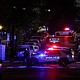 Police officers work at the site of the shooting.
Mandatory Credit:	Jonathan Ernst/Reuters via CNN Newsource