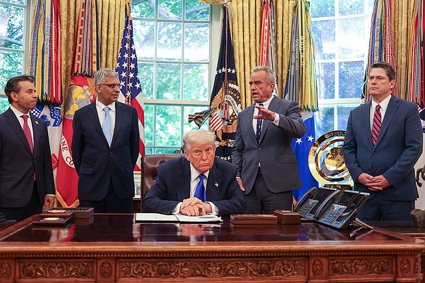 US Secretary of Health and Human Services Robert F. Kennedy Jr. speaks alongside Food and Drug Administration Commissioner Martin Makary, Director of the National Institutes of Health Jayanta Bhattachary, President Donald Trump, and speechwriter and political advisor Vince Haley during an executive orders signing event in the Oval Office of the White House in Washington, DC, on May 5.
Mandatory Credit:	Alex Wroblewski/AFP/Getty Images via CNN Newsource