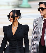 Kim Kardashian, accompanied by Kris Jenner, leaves the courthouse of the trial of 10 people accused of stealing millions of dollars worth of jewellery from her, in Paris, France, on May 13.
Mandatory Credit:	Piroschka Van De Wouw/Reuters via CNN Newsource