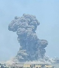 A large explosion rocked a chemical plant in eastern China on Tuesday, spewing a towering plume of gray and orange smoke into the sky, damaging windows in nearby buildings and prompting local authorities to launch a rescue operation.
Mandatory Credit:	Social Media via CNN Newsource