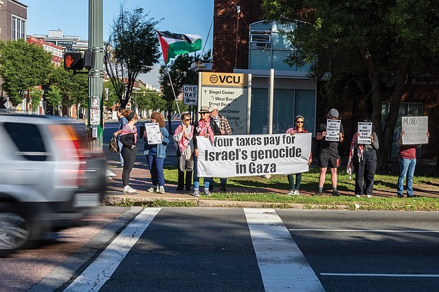 Several Richmond organizations — including Richmond for Palestine, the VCU chapter of Students for Justice in Palestine, and the Virginia Defenders for Freedom, Justice & Equality — gather at the intersection of Broad and Belvidere streets on Friday, May 23, to protest the Israeli ground operation in the Gaza Strip.