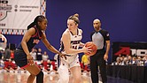 Richmond’s Ally Sweeney (14) controls the ball during a 63-58 win over Duquesne in Game 8 of the A-10 Women’s Basketball Championship on Friday, March 7, at the Henrico Sports & Events Center. The tournament will remain in Henrico through 2027 under a new Atlantic 10 deal.
