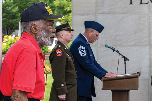 U.S. Navy veteran Henry Mack stands in solemn reflection as the names of nearly 12,000 Virginians who died in battle from World War II to the present are read aloud during the inaugural “Say Their Names Marathon” at the Virginia War Memorial on Monday, May 26.