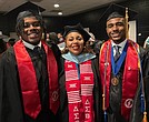 Brothers J.T. Davis (left) and Shea Davis (right) celebrate their graduation from Reynolds Community College alongside their mother, Stacie Davis, dean of the college’s School of Business and Industrial Trades.