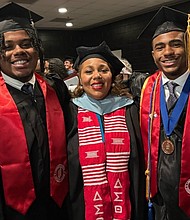 Brothers J.T. Davis (left) and Shea Davis (right) celebrate their graduation from Reynolds Community College alongside their mother, Stacie Davis, dean of the college’s School of Business and Industrial Trades.