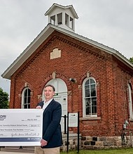 Left to right: Emily Dabish Yahkind, Superior Township Supervisor and John Robb, President, Hyundai America Technical Center, Inc. (HATCI) at the Dixboro Historic School House on Friday, May 30, 2025.