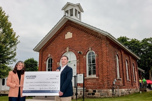 Left to right: Emily Dabish Yahkind, Superior Township Supervisor and John Robb, President, Hyundai America Technical Center, Inc. (HATCI) at the Dixboro Historic School House on Friday, May 30, 2025.