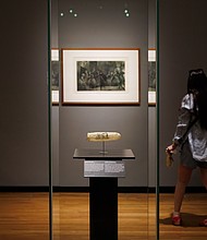 The condom is part of an exhibit on 19th-century prostitution and sexuality. The condom is decorated with an erotic etching featuring a nun and three clergymen, is going on display at a museum in the Netherlands
Mandatory Credit:	Kelly Schenk/Rijksmuseum via CNN Newsource