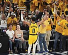 Indiana Pacers guard Tyrese Haliburton celebrates May 31 after a teammate made a 3-pointer during the second half of Game 6 of the Eastern Conference finals of the NBA basketball playoffs against the New York Knicks in Indianapolis.