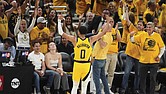 Indiana Pacers guard Tyrese Haliburton celebrates May 31 after a teammate made a 3-pointer during the second half of Game 6 of the Eastern Conference finals of the NBA basketball playoffs against the New York Knicks in Indianapolis.