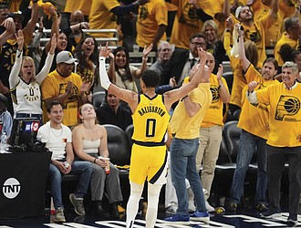 Indiana Pacers guard Tyrese Haliburton celebrates May 31 after a teammate made a 3-pointer during the second half of Game 6 of the Eastern Conference finals of the NBA basketball playoffs against the New York Knicks in Indianapolis.