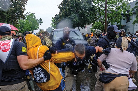 Dozens of protesters converged in the heart of the Latino community in Minneapolis on Tuesday after a large force of … Dozens of protesters converged in the heart of the Latino community in Minneapolis on Tuesday after a large force of …