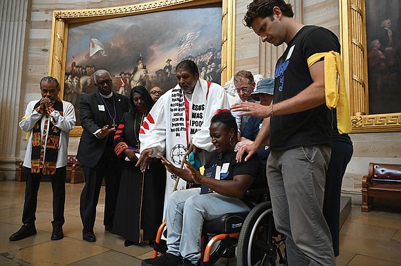 A group of clergy, faith-based protesters and disability advocates were once again arrested in the U.S. Capitol Rotunda on Monday, … A group of clergy, faith-based protesters and disability advocates were once again arrested in the U.S. Capitol Rotunda on Monday, …