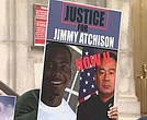 This image taken from video shows Jimmy Atchison’s family holding a vigil June 4 in Atlanta, insisting they get some answers three years after he was shot and killed when Atlanta police tried to arrest him.