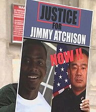 This image taken from video shows Jimmy Atchison’s family holding a vigil June 4 in Atlanta, insisting they get some answers three years after he was shot and killed when Atlanta police tried to arrest him.