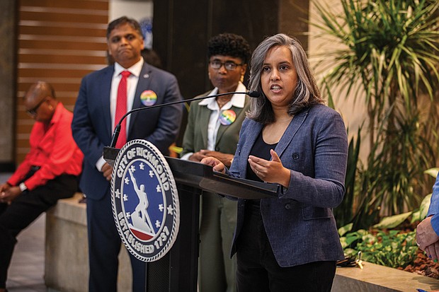 Narissa Rahaman, executive director of Equality Virginia, speaks during the event celebrating the raising of the Progress Pride Flag at City Hall.