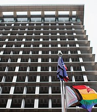 The Progress Pride Flag flies outside City Hall in recognition of National LGBTQ+ Pride Month. The flag’s design includes the traditional rainbow along with black, brown, pink, light blue and white stripes to honor LGBTQ+ people of color and the transgender community.