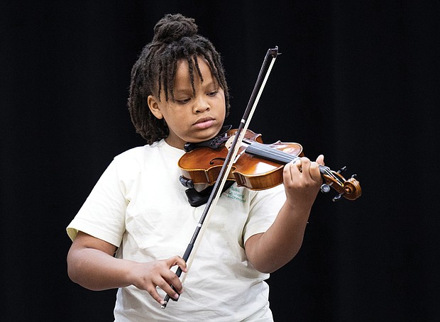 Qmaya-Leigh Owens, a Music Orchard Richmond and Peter Paul RVA participant, plays during the concert that showcased the talents of young musicians with one or more years of practice.